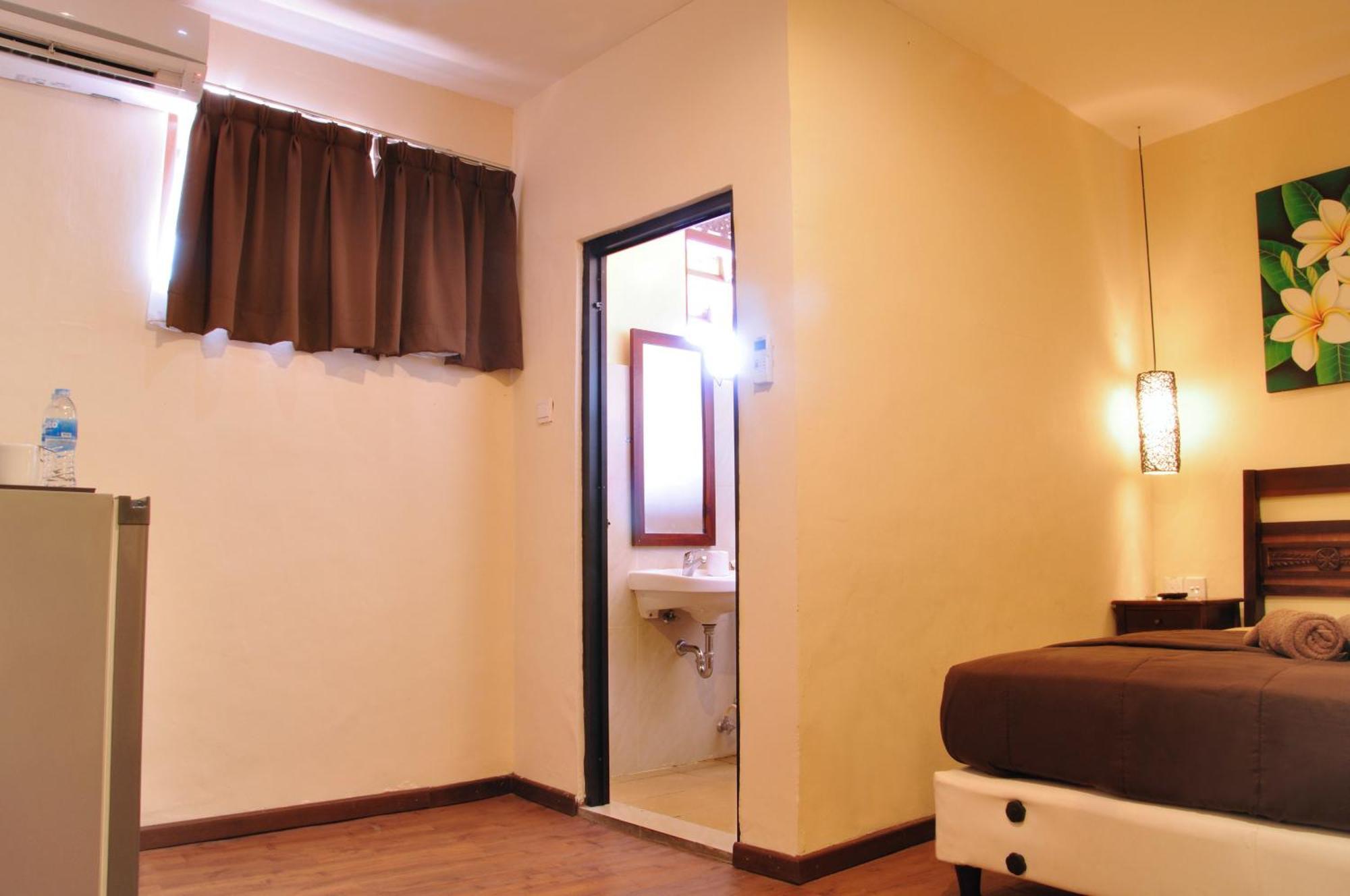 Bemo Corner Guest House Kuta Lombok Værelse billede